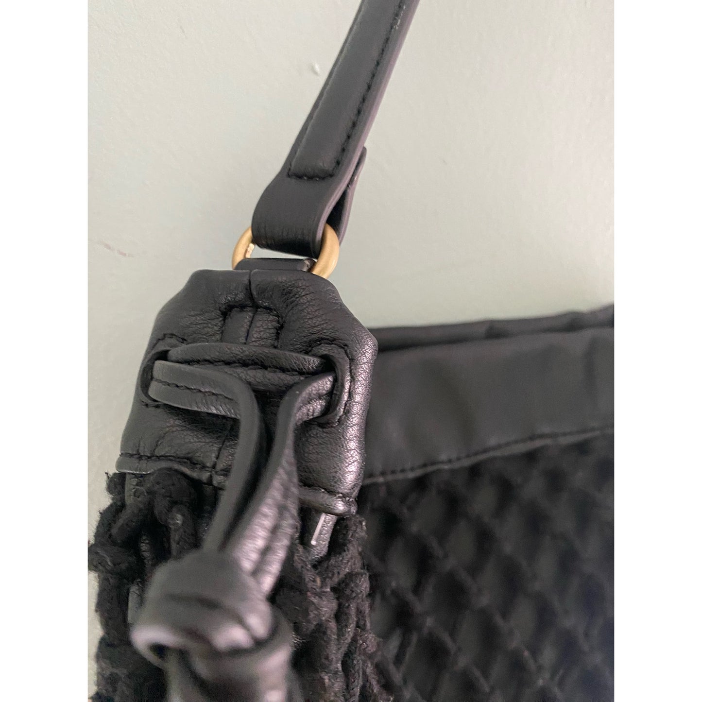 Elizabeth and James Kohl’s Black Handbag