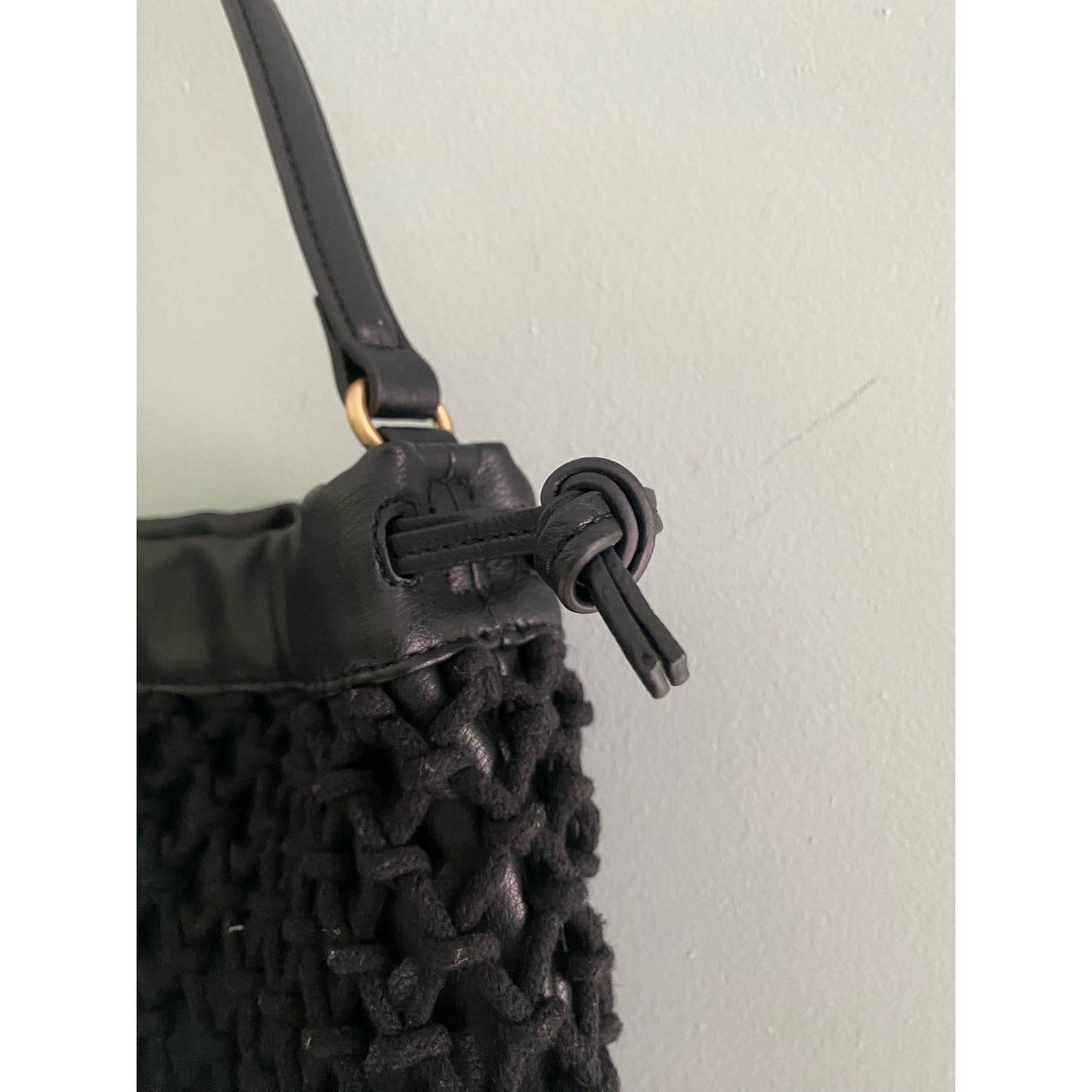 Elizabeth and James Kohl’s Black Handbag